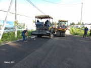 Укладываем асфальтовую крошку в Разметелево